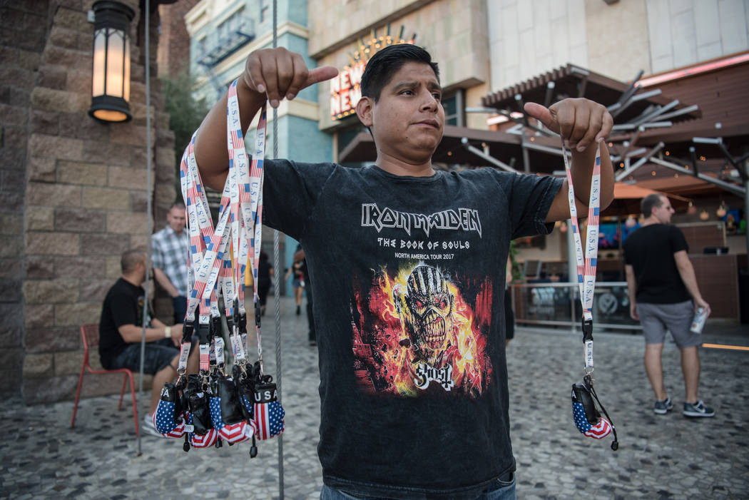 Roberto Rodriguez selling miniature boxing gloves before Floyd Mayweather Jr. takes on Conor McGregor at T-Mobile Arena, Saturday, Aug. 26, 2017, in Las Vegas. Morgan Lieberman Las Vegas Review-Jo ...