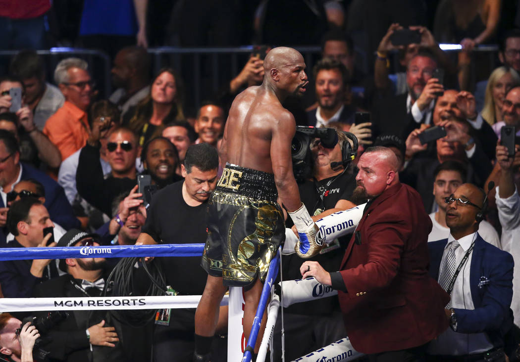 Floyd Mayweather Jr. after defeating Conor McGregor in their super welterweight fight at T-Mobile Arena, Saturday, Aug. 26, 2017, in Las Vegas. Mayweather won via 10th round technical knockout. Ch ...