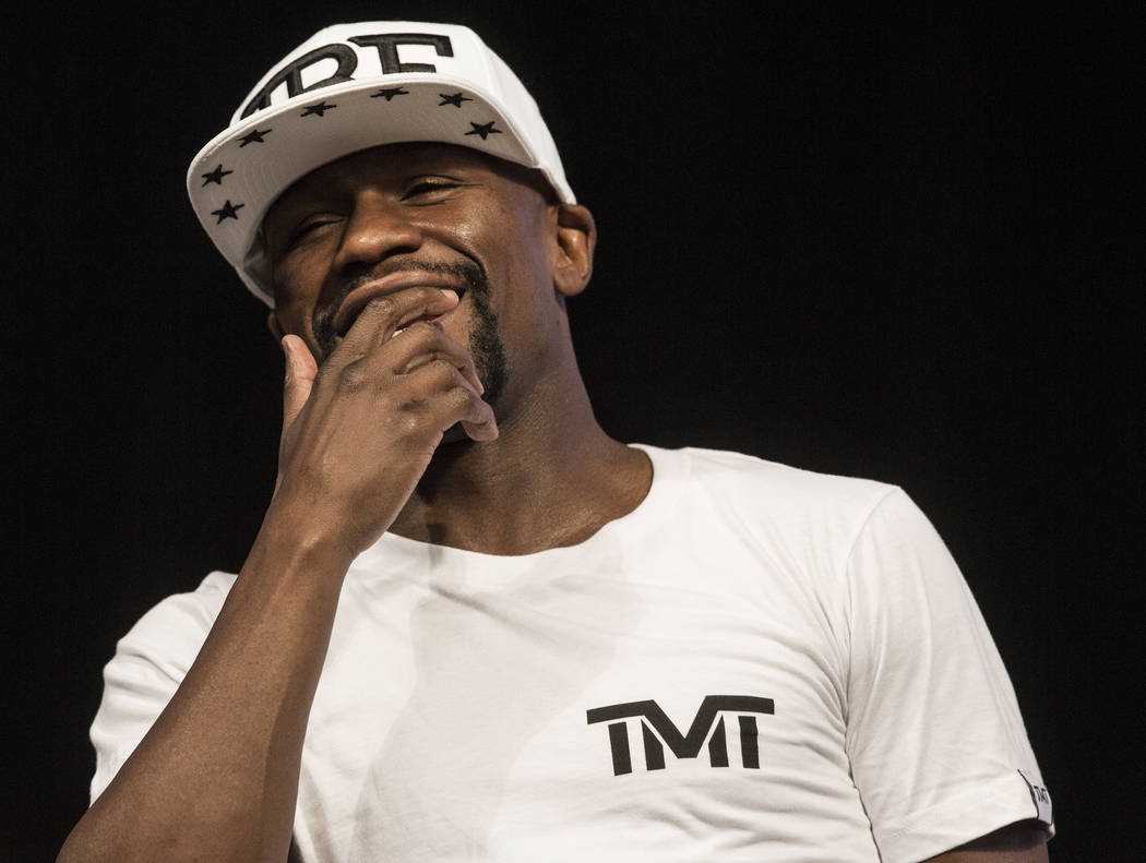 Floyd Mayweather Jr. laughs at Conor McGregor's antics during weigh-ins on Friday, Aug 25, 2017, at T-Mobile Arena, in Las Vegas. Benjamin Hager Las Vegas Review-Journal @benjaminhphoto