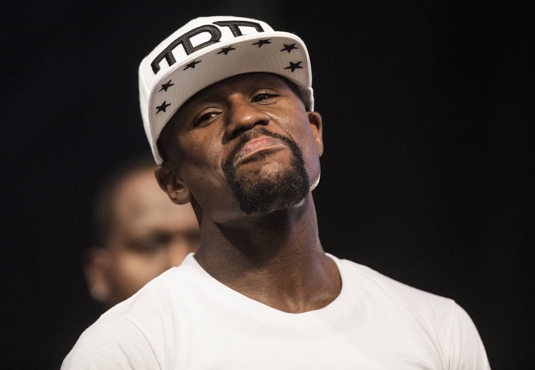 Floyd Mayweather Jr. laughs at Conor McGregor's antics during weigh-ins on Friday, Aug 25, 2017, at T-Mobile Arena, in Las Vegas. Benjamin Hager Las Vegas Review-Journal @benjaminhphoto