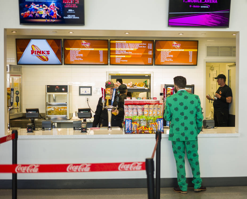 Conor McGregor fan Everett Johnson orders beer before the famed UFC fighter takes on Floyd Mayweather Jr. at T-Mobile Arena, Saturday, Aug. 26, 2017, in Las Vegas. Chase Stevens Las Vegas Review-J ...