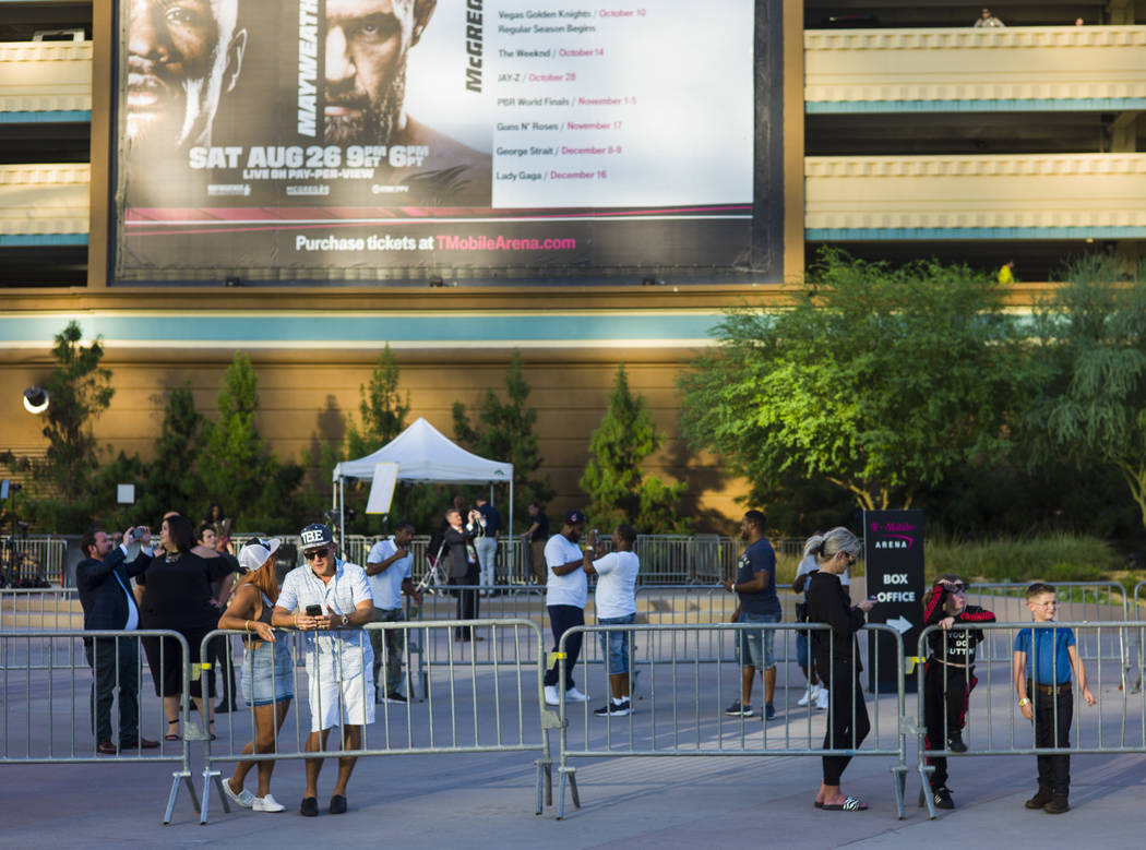 Fans outside before Floyd Mayweather Jr. takes on Conor McGregor at T-Mobile Arena, Saturday, Aug. 26, 2017, in Las Vegas. Chase Stevens Las Vegas Review-Journal