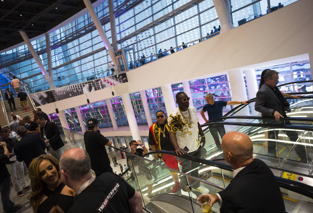 Fight fans arrive before Floyd Mayweather Jr. takes on Conor McGregor at T-Mobile Arena, Saturday, Aug. 26, 2017, in Las Vegas. Chase Stevens Las Vegas Review-Journal