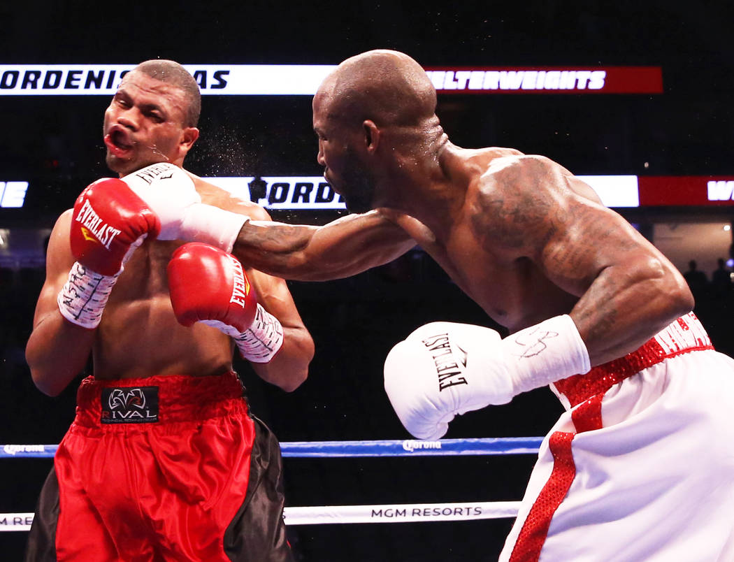 Yordenis Ugas, right, lands a punch against Thomas Dulorme in the 2nd round on Saturday, Aug 26, 2017, at T-Mobile Arena, in Las Vegas. Benjamin Hager Las Vegas Review-Journal @benjaminhphoto