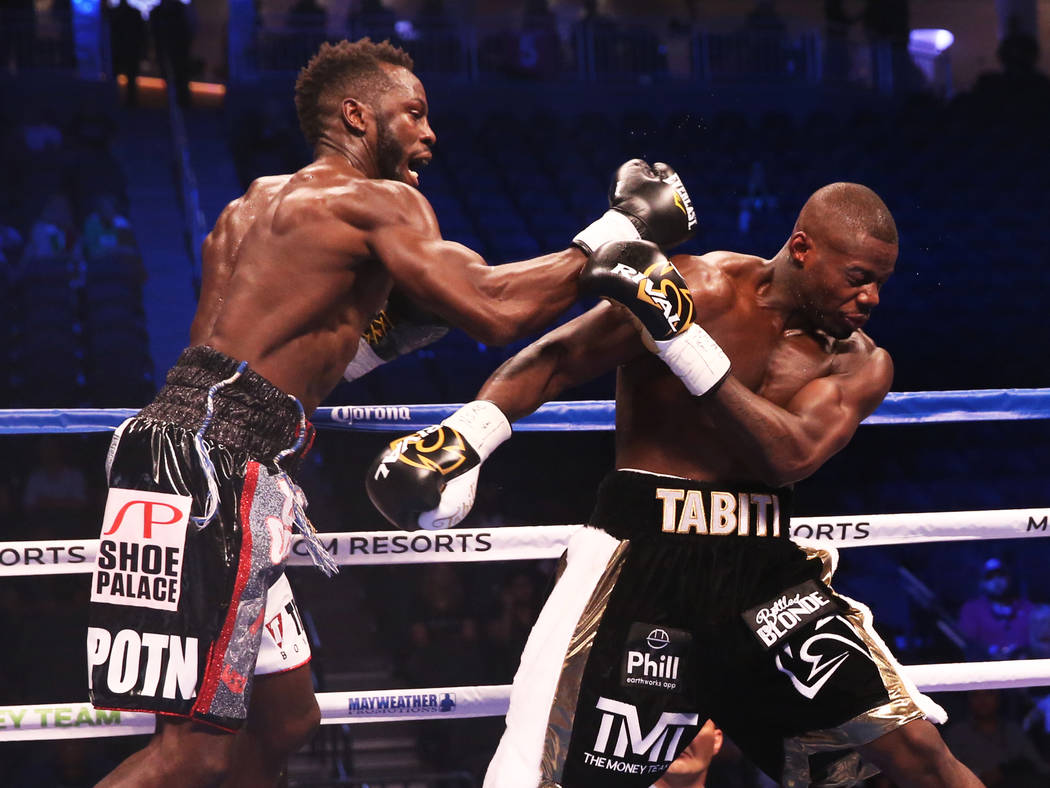 Steve Cunningham, left, lands a punch against Andrew Tabiti in the 1st round on Saturday, Aug 26, 2017, at T-Mobile Arena, in Las Vegas. Benjamin Hager Las Vegas Review-Journal @benjaminhphoto
