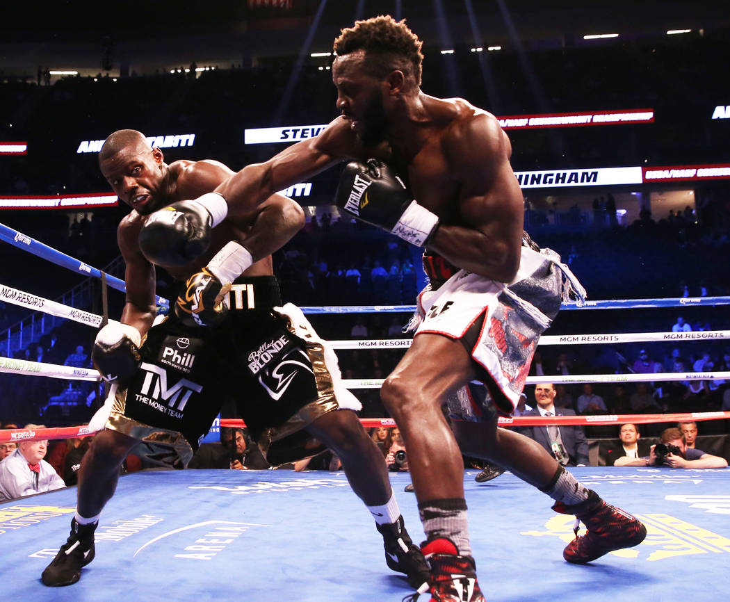 Steve Cunningham, right, lands a punch against Andrew Tabiti in the 4th round on Saturday, Aug 26, 2017, at T-Mobile Arena, in Las Vegas. Benjamin Hager Las Vegas Review-Journal @benjaminhphoto
