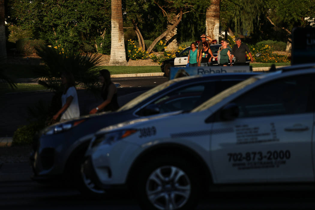 Hotel guests walk outside of the Westgate after a balcony fire broke out in Las Vegas on Aug. 26, 2017. Joel Angel Juarez Las Vegas Review-Journal @jajuarezphoto