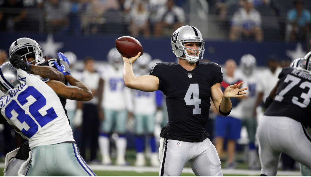 Dallas Cowboys cornerback Orlando Scandrick (32) pressures the pocket as Oakland Raiders quarterback Derek Carr (4) throws a pass in the first half of a preseason NFL football game, Saturday, Aug. ...