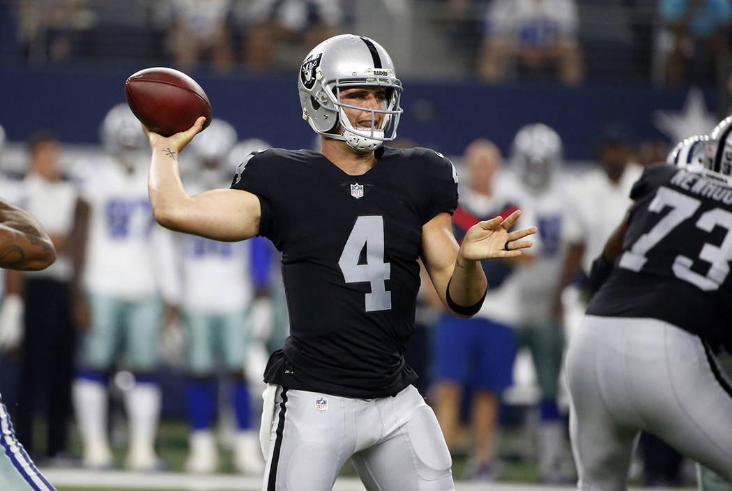 Dallas Cowboys cornerback Orlando Scandrick (32) pressures the pocket as Oakland Raiders quarterback Derek Carr (4) throws a pass in the first half of a preseason NFL football game, Saturday, Aug. ...