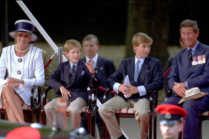 From left, Princess Diana, her sons Prince Harry and Prince William and Prince Charles, from left, watch a veteran's parade during the 50th anniversary of VJ Day commemorations in London in August ...