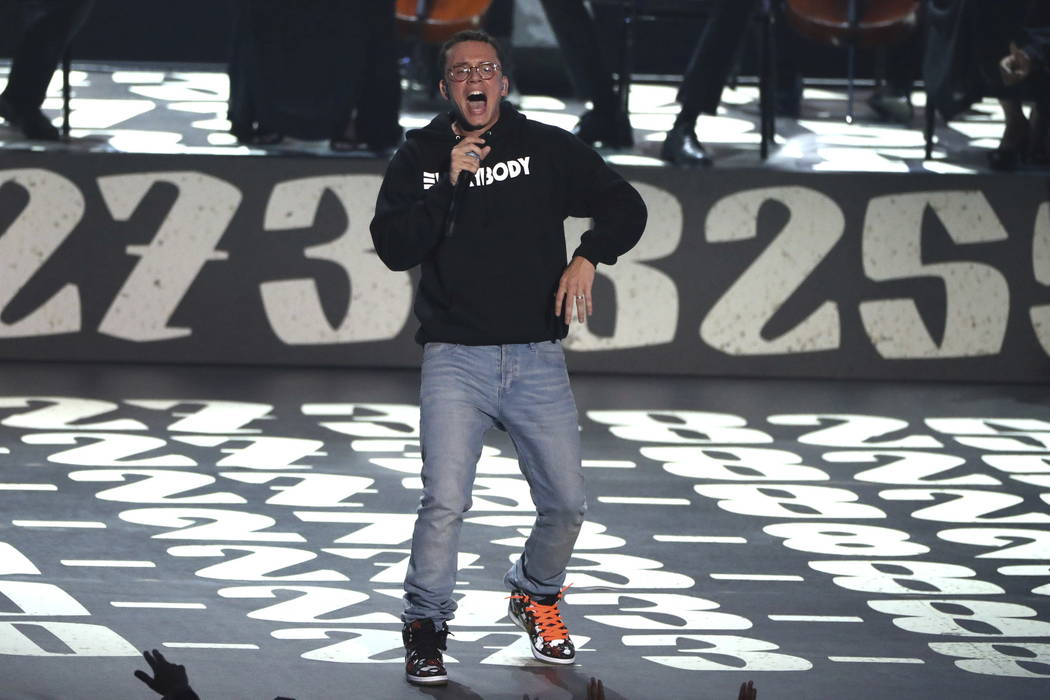 Logic performs "1-800-272-8255" at the MTV Video Music Awards at The Forum on Sunday, Aug. 27, 2017, in Inglewood, Calif. (Photo by Matt Sayles/Invision/AP)