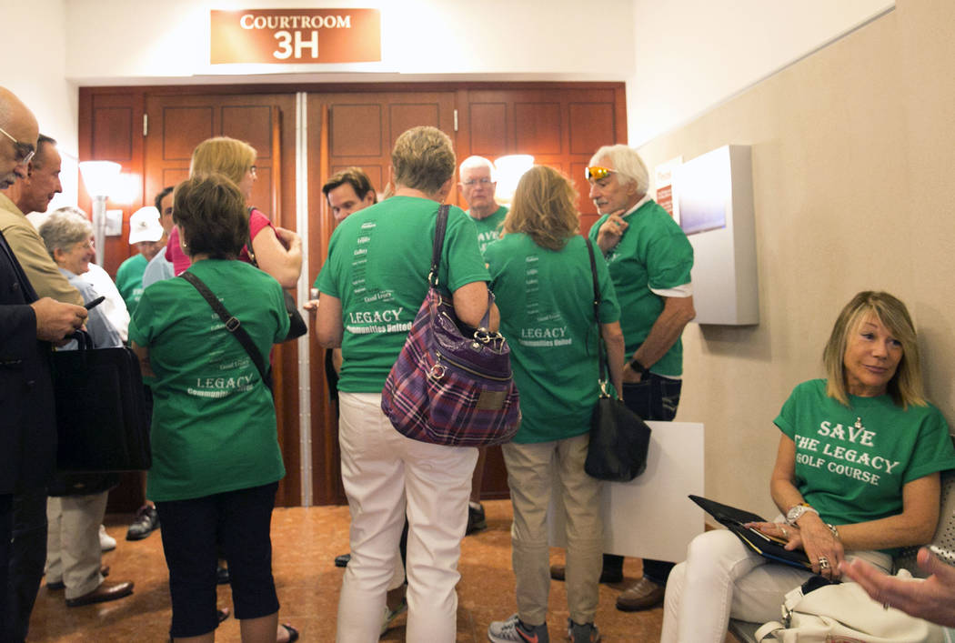 Henderson residents living in homes surrounding the recently purchased Legacy Golf Club wait outside the courtroom at the Regional Justice Center on Tuesday, Aug. 29, 2017, in Las Vegas. (Bizuayeh ...