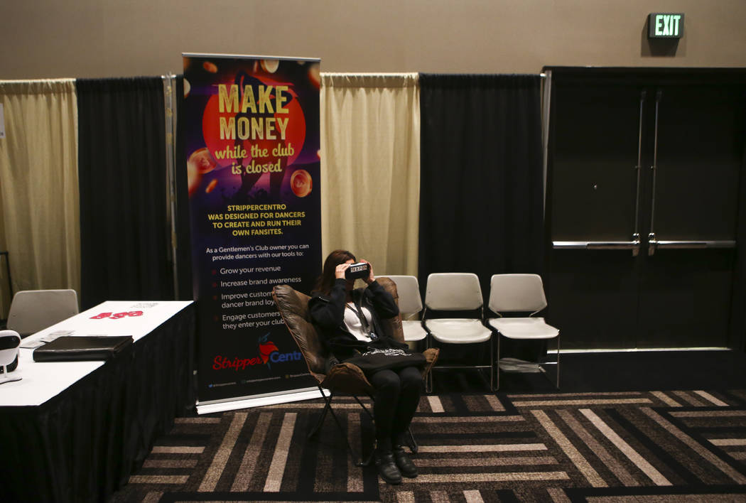 An attendee tests out virtual reality goggles by Terpon during the Gentlemen's Club Expo at Hard Rock Hotel in Las Vegas on Tuesday, Aug. 29, 2017. Chase Stevens Las Vegas Review-Journal @cssteven ...