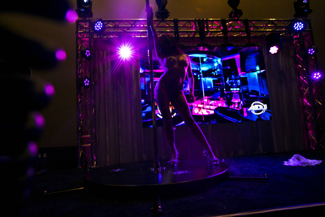 A performer at the Sound Stage Systems booth during the Gentlemen's Club Expo at Hard Rock Hotel in Las Vegas on Tuesday, Aug. 29, 2017. Chase Stevens Las Vegas Review-Journal @csstevensphoto