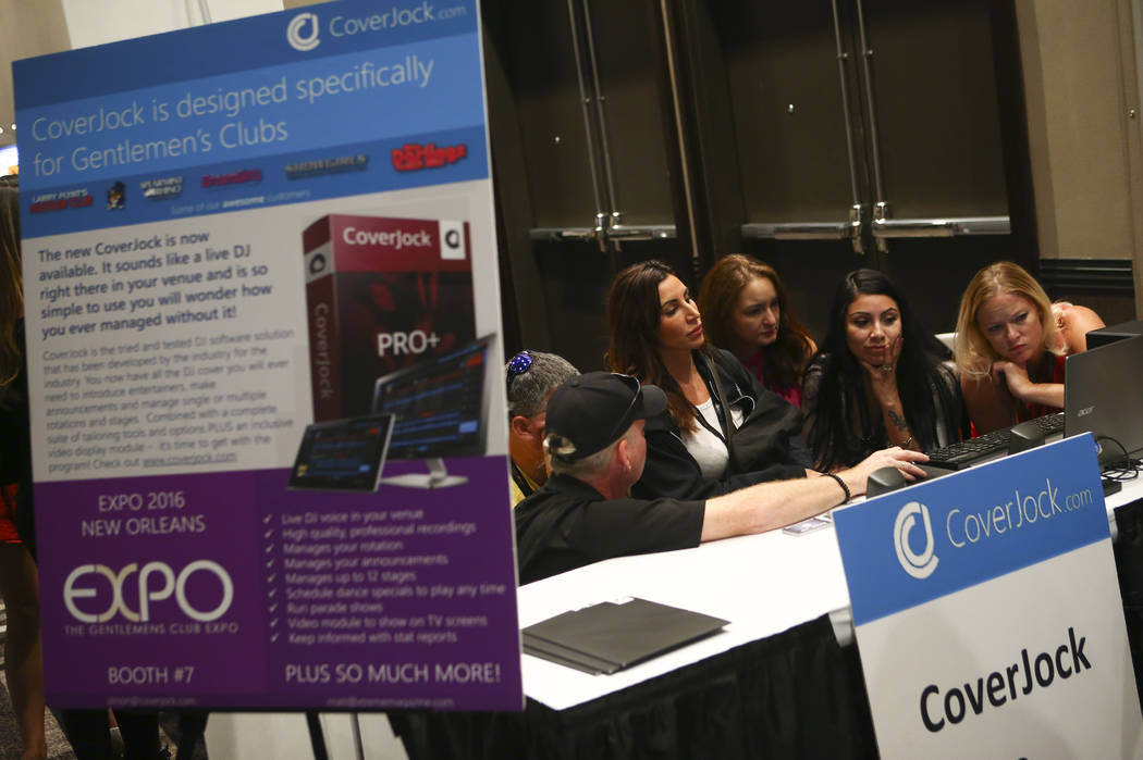Attendees check out the CoverJock booth during the Gentlemen's Club Expo at Hard Rock Hotel in Las Vegas on Tuesday, Aug. 29, 2017. Chase Stevens Las Vegas Review-Journal @csstevensphoto