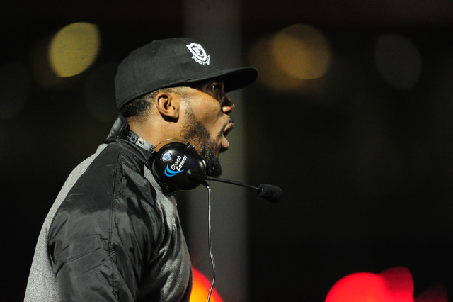 Faith Lutheran head coach Vernon Fox tries to fire up his players in the first half of their prep football game against Bishop Gormanat Bishop Gorman High School in Las Vegas Friday, Nov. 18, 2016 ...