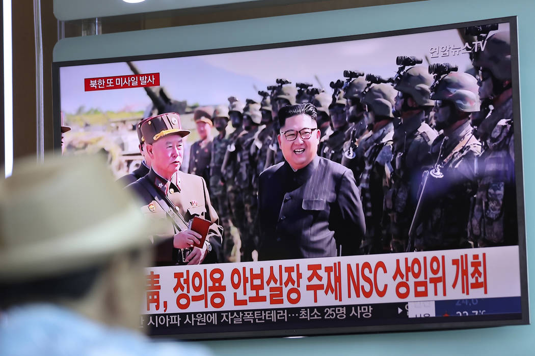 A man watches a screen showing an image of North Korean leader Kim Jong Un, Saturday, Aug. 26, 2017, at the Seoul Train Station in Seoul, South Korea. (Lee Jin-man, File, AP)