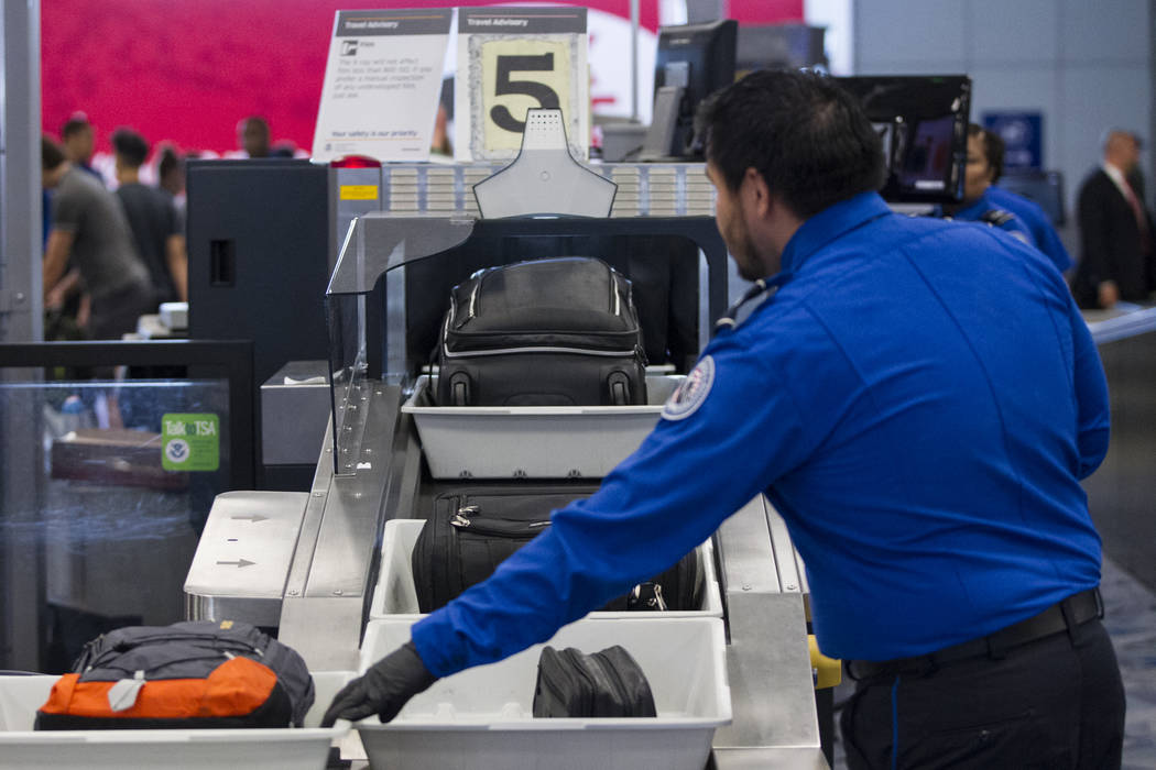 Bags are scanned in one of the new automated screening lanes at McCarran International Airport Terminal 1 in Las Vegas, on Thursday, Aug. 31, 2017. Erik Verduzco Las Vegas Review-Journal @Erik_Ver ...