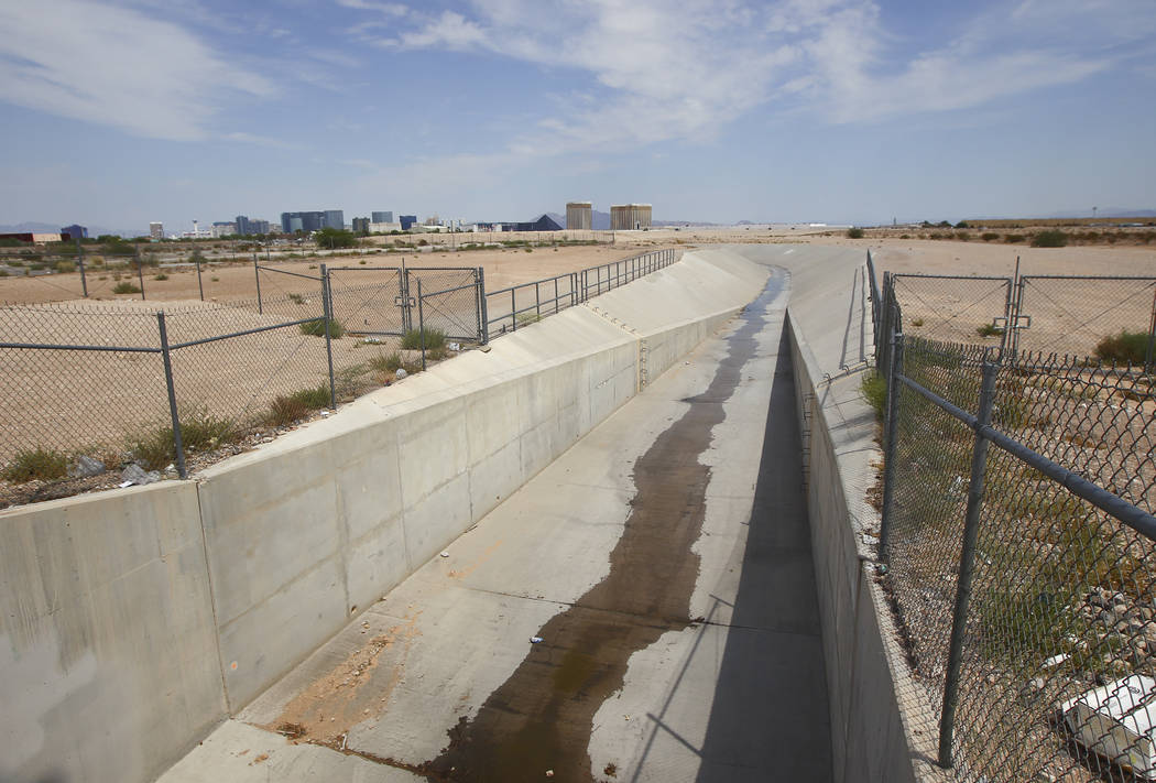 The Tropicana Detention Basin, which flows into the Flamingo Wash, off of Decatur Boulevard in Las Vegas on Thursday, Aug. 31, 2017. An underground flood-control culvert cuts through the planned L ...