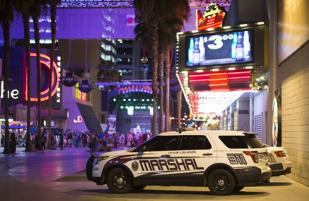 Las Vegas city marshal squad cars along 3rd Street off of the Fremont Street Experience in downtown Las Vegas on Wednesday, Aug. 2, 2017. The officers, with the help of the tourist district's secu ...