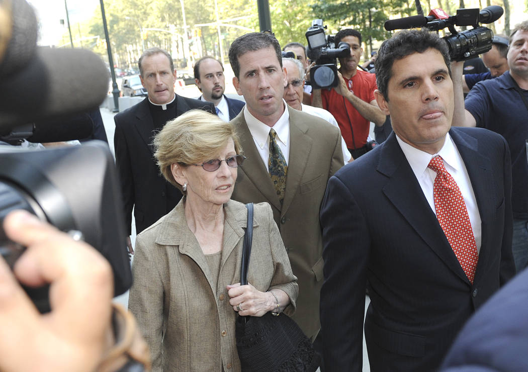 Former NBA referee Tim Donaghy center, arrives at Brooklyn federal court for his sentencing, Tuesday, July 29, 2008, in New York. Donaghy pleaded guilty in August 2007 to federal charges that he t ...