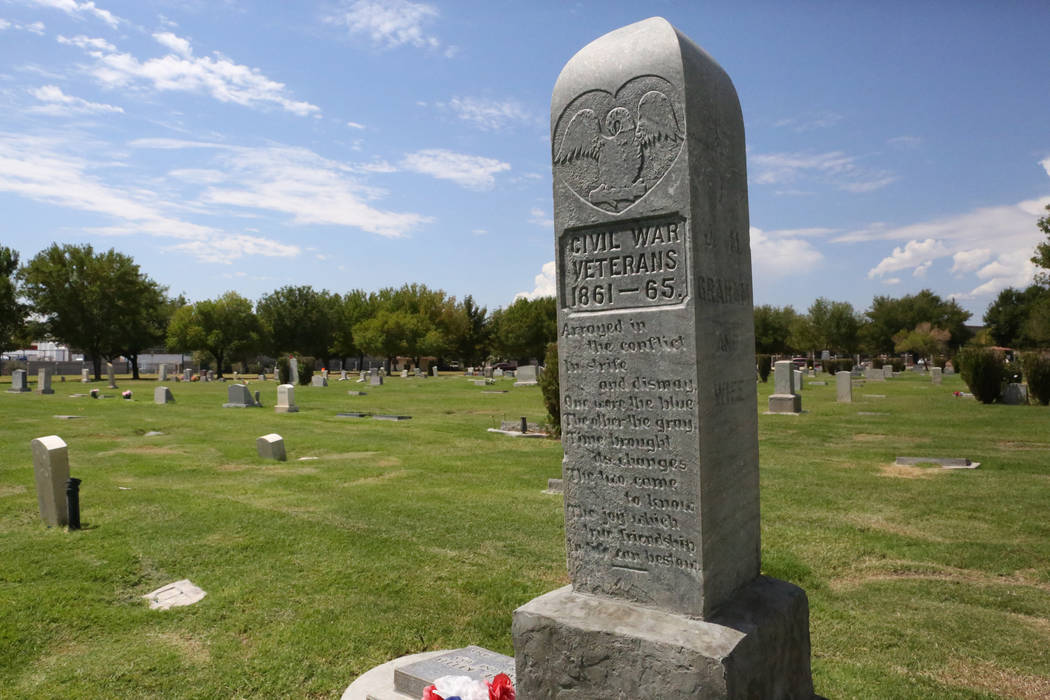 A granite pillar marks the grave site of two Civil War veterans, one blue the other gray, at the Woodlawn Cemetery in Las Vegas on Tuesday, Aug. 29, 2017. (Michael Quine/Las Vegas Review-Journal)  ...