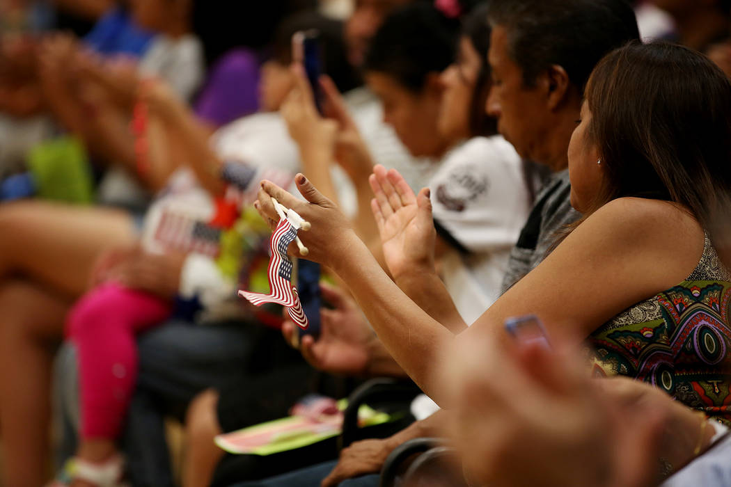 Attendees clap during an informative event on Deferred Action for Childhood Arrivals at East Las Vegas Community Center on Tuesday, Sept. 5, 2017. Bridget Bennett Las Vegas Review-Journal @bridget ...