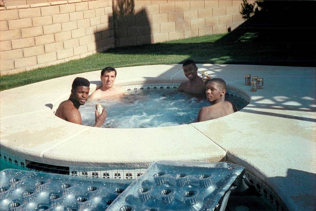 Richard “The Fixer” Perry, second from left, with UNLV players, from left, Moses Scurry, Anderson Hunt and David Butler in a photograph that was published in the Las Vegas Review-Jou ...