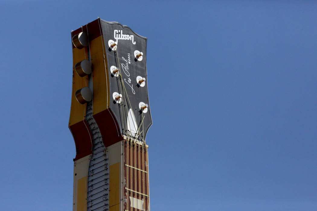 The Hard Rock Café neon sign with its distinctive Gibson Les Paul headstock at the corner of Harmon and Paradise is coming down and moving to a new home in the Neon Museum. Friday, September  ...