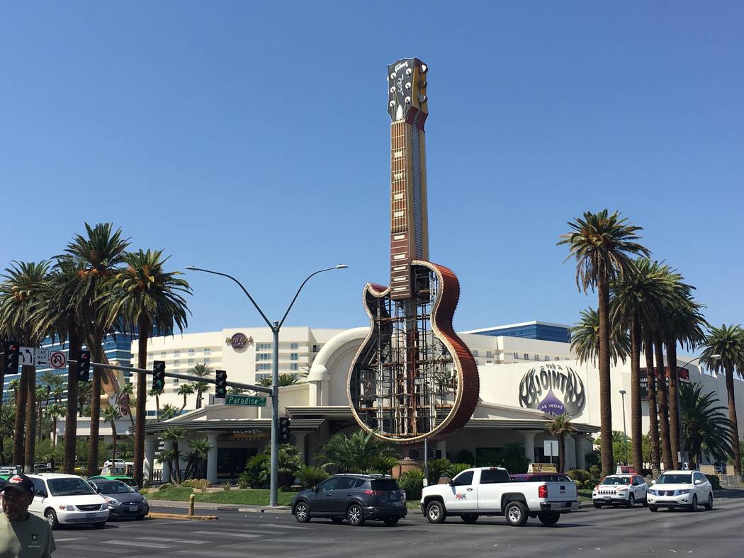 The disassembled Hard Rock Cafe sign on the corner of Harmon Avenue and Paradise Road, shown on Friday, Sept. 1, 2017. (John Katsilometes/Las Vegas Review-Journal) @JohnnyKats