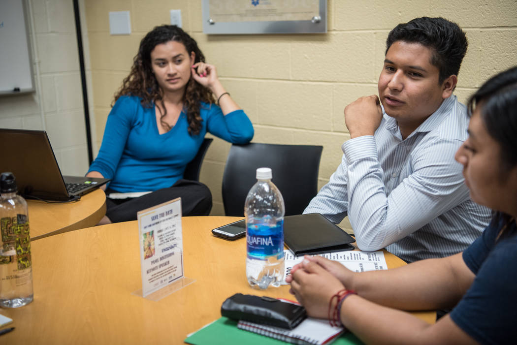 College of Southern Nevada students Cristian Aguina, left, and Jessica Duran, right, at the Generation Dreamers club meeting with teacher Esther Pla-Cazares at CSN North Las Vegas on Tuesday, Sep. ...