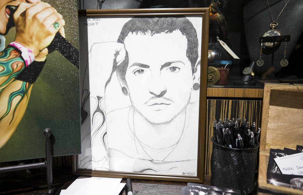 A sketch of singer and songwriter Chester Bennington sits at a memorial at Club Tattoo inside Planet Hollywood on Saturday, Sept. 2, 2017, in Las Vegas following a memorial for Bennington at the S ...