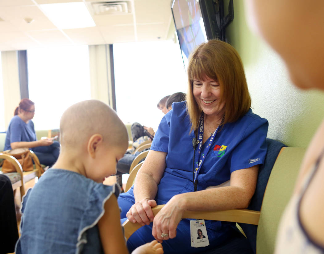 Sue Collins Waltermeyer, a child life specialist, plays with patient Madilyn Cash, 4, at the Children's Specialty Center of Nevada in Las Vegas, Tuesday, Sept. 5, 2017. (Elizabeth Brumley/Las Vega ...