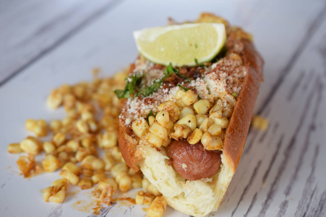 Dirt Dog’s elote dog is topped with Mexican street corn Las Vegas