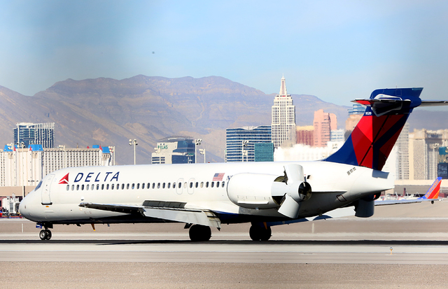 A Delta Airlines plane taxis after landing at McCarran International Airport on Wednesday, Feb. 15, 2017, in Las Vegas. (Bizuayehu Tesfaye/Las Vegas Review-Journal) @bizutesfaye