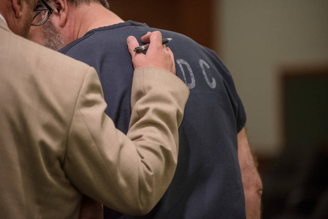 Jailed attorney Robert Graham, with his lawyer Bryan Cox, pleads guilty to stealing $16 million from his clients during a court hearing on Thursday, Sep. 7, 2017, at Regional Justice Center in Las ...