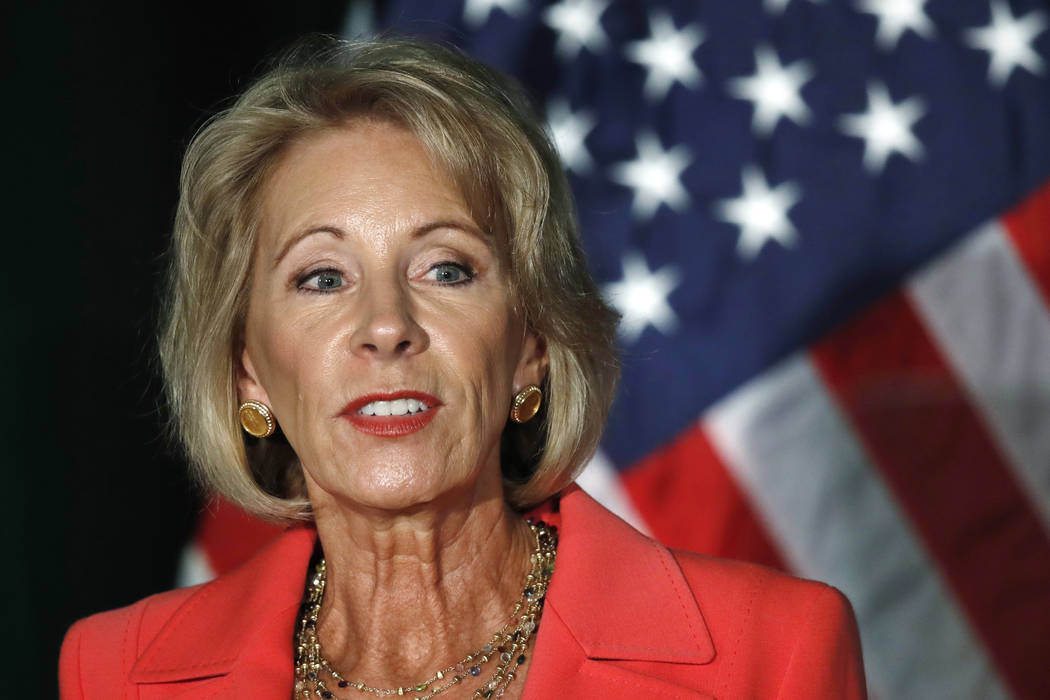 Education Secretary Betsy DeVos speaks about campus sexual assault and enforcement of Title IX, the federal law that bars discrimination in education on the basis of gender, Thursday, Sept. 7, 201 ...