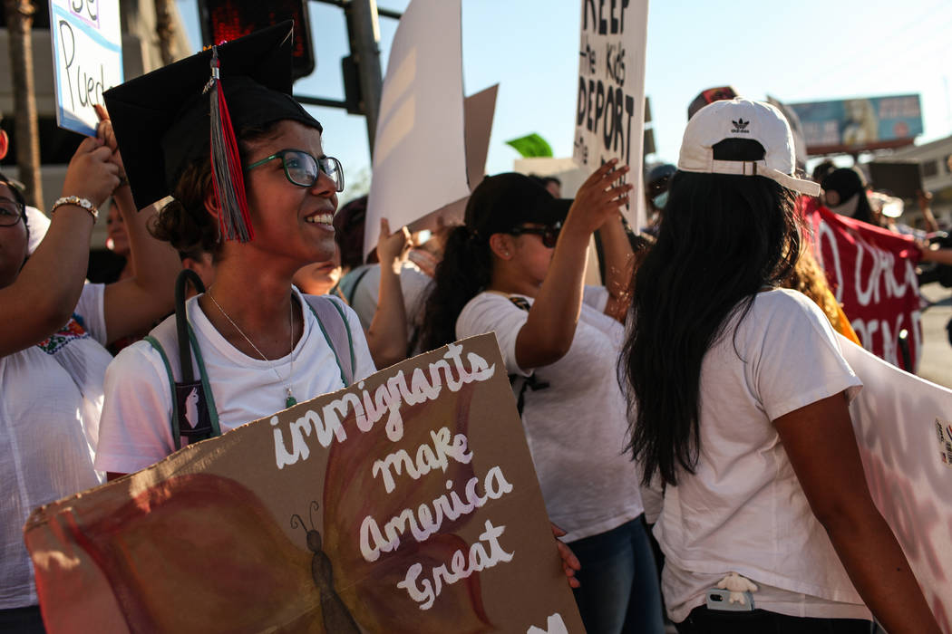 Several hundred DACA recipients and supporters including UNLV graduate and teacher Marcela Rodriguez Campo march down the Strip in Las Vegas, Sunday, Sept. 10, 2017, to call on President Donald Tr ...