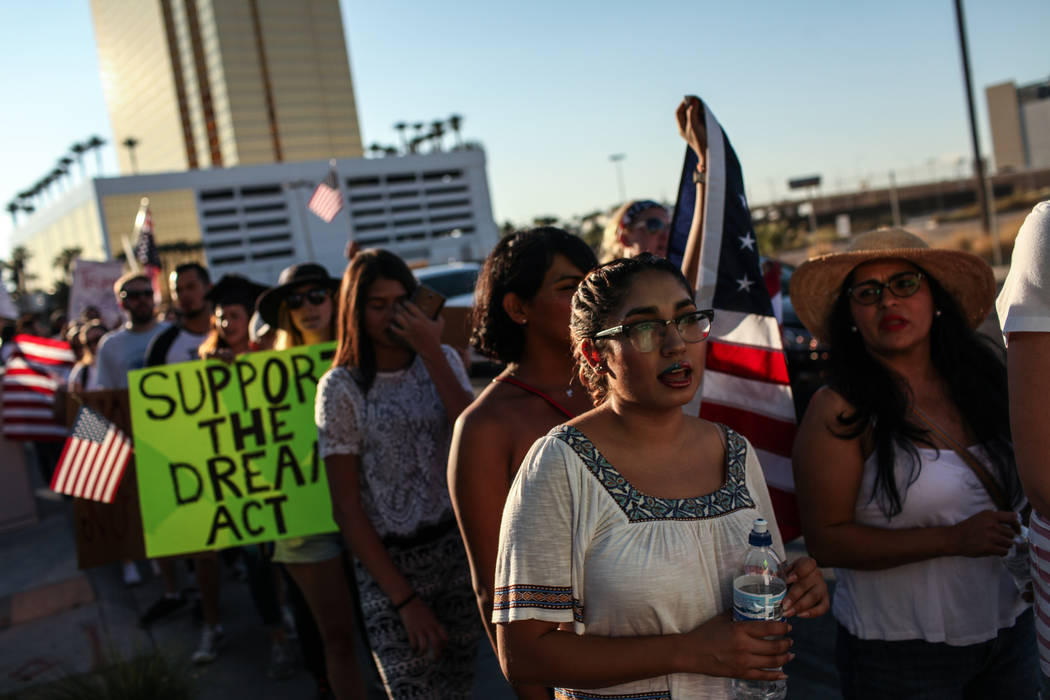 Several hundred DACA recipients and supporters including Natalia Leal march down the Strip in Las Vegas, Sunday, Sept. 10, 2017, to call on President Donald Trump and Nevada elected officials to p ...