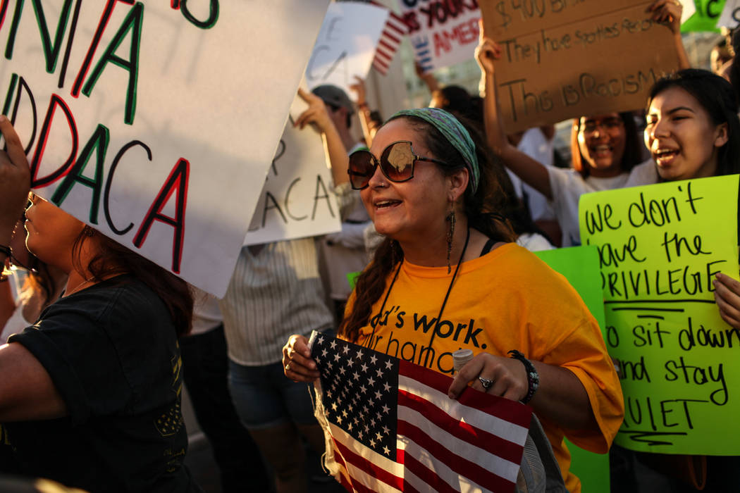 Several hundred DACA recipients and supporters including Erin Adams march down the Strip in Las Vegas, Sunday, Sept. 10, 2017, to call on President Donald Trump and Nevada elected officials to pro ...