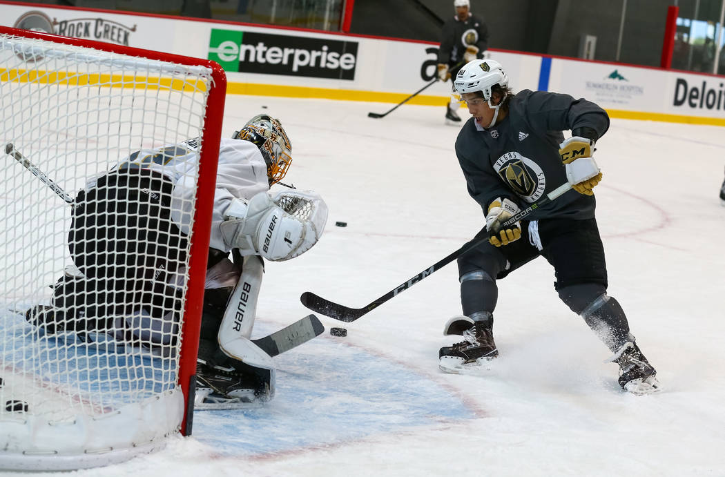 Vegas Golden Knights forward Tyler Wong, right, shoots on goalie Logan Thompson during the final day of rookie camp practice at City National Arena on Monday, Sept. 11, 2017, in Las Vegas. Richard ...