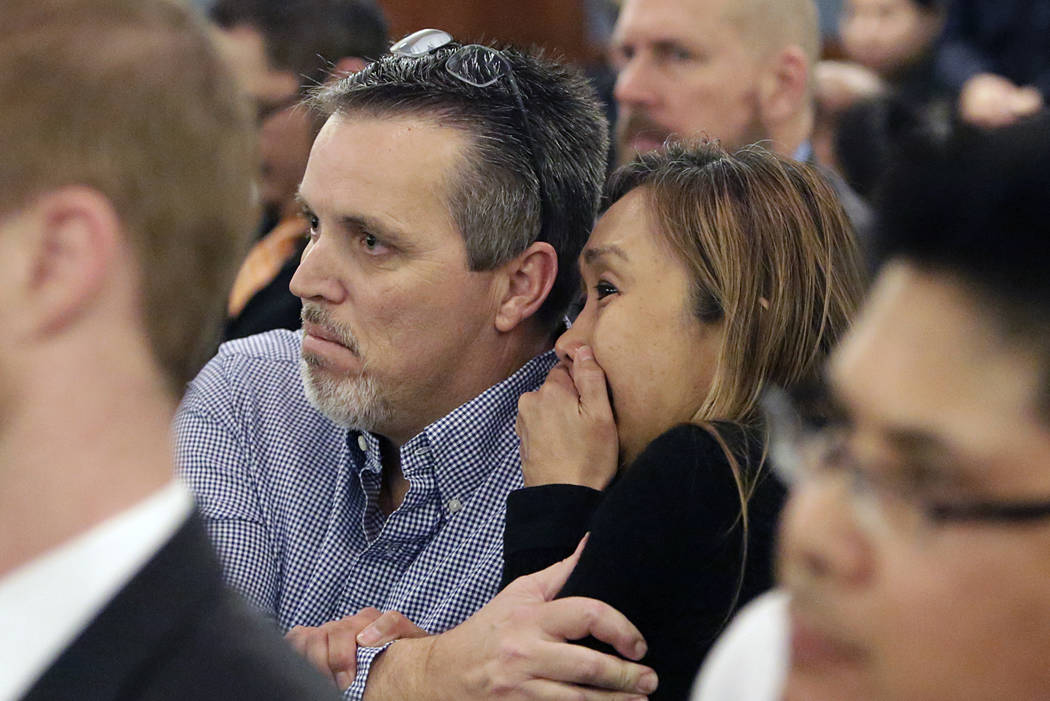 Marcia Fajardo, right, mother of Jaelan Jonson Fajardo who died in a crash caused by a drunk driver, David Fensch, not photographed, comforted by her husband James Tierney as Fensch appears at the ...