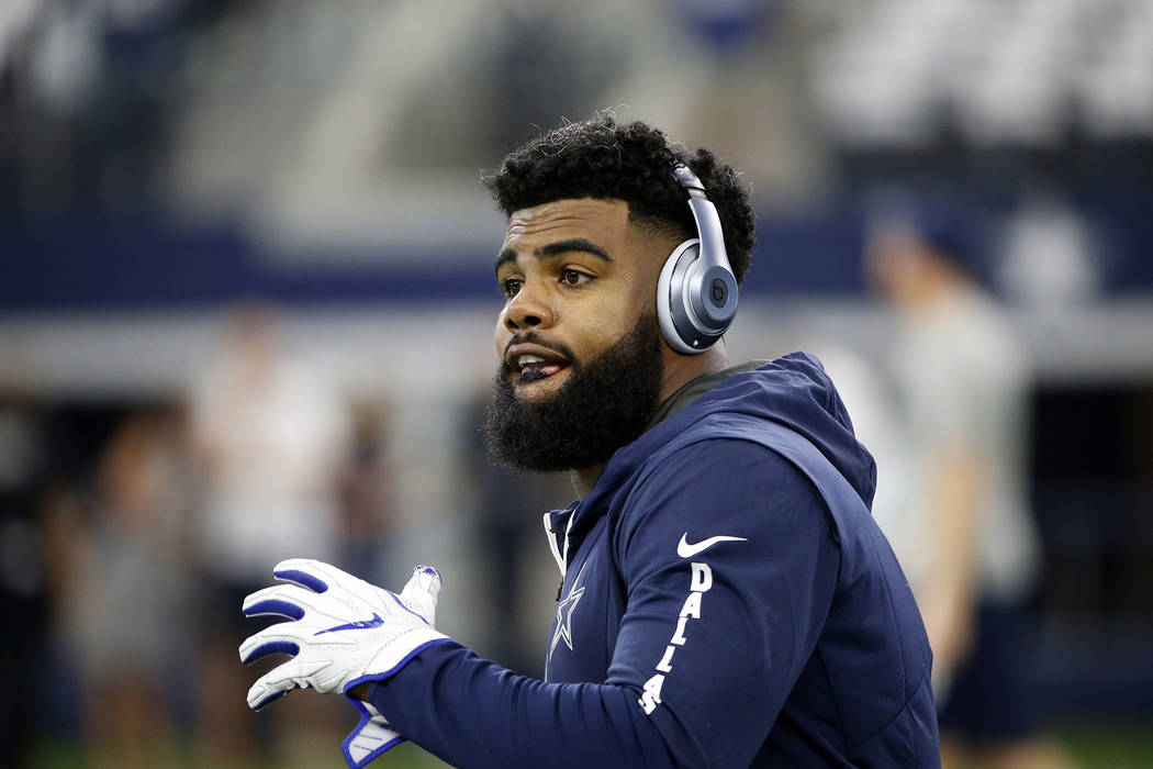 Dallas Cowboys running back Ezekiel Elliott warms up before an NFL football game against the New York Giants on Sunday, Sept. 10, 2017, in Arlington, Texas. (AP Photo/Ron Jenkins)