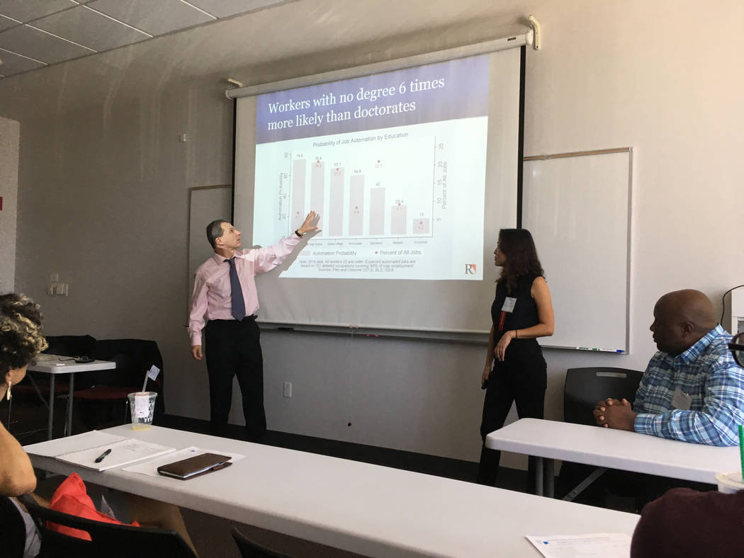 Johannes Moenius, left, a professor at University of Redlands and founding director of the university's Institute for Spatial Economic Analysis, and Jess Chen, a research fellow at the institute,  ...
