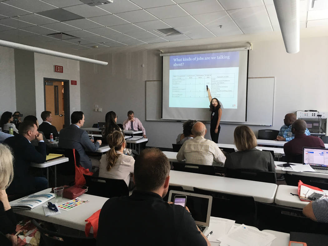 Johannes Moenius, left, a professor at University of Redlands and founding director of the university's Institute for Spatial Economic Analysis, and Jess Chen, a research fellow at the institute, ...