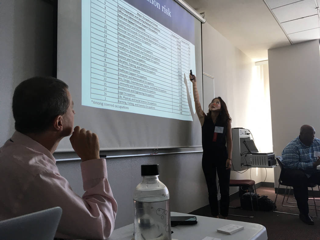 Johannes Moenius, left, a professor at University of Redlands and founding director of the university's Institute for Spatial Economic Analysis, and Jess Chen, a research fellow at the institute, ...