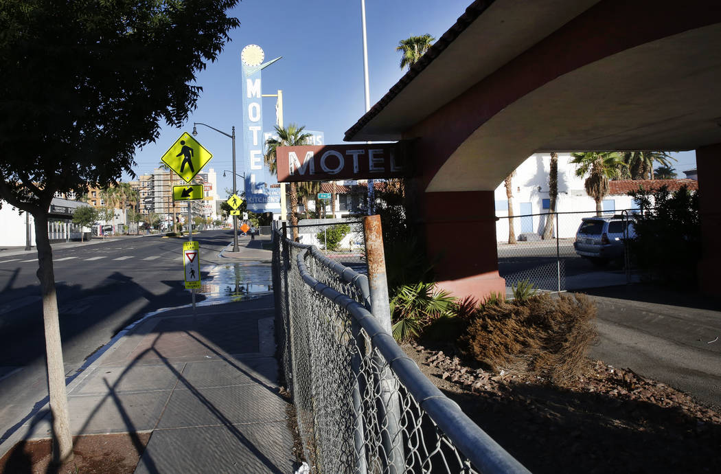 A boarded up Travelers Motel on 1100 Fremont St., right, and Motel Fergusons on 1028 Fremont St., in downtown Las Vegas on Tuesday, Sept. 12, 2017. Bizuayehu Tesfaye Las Vegas Review-Journal @bizu ...