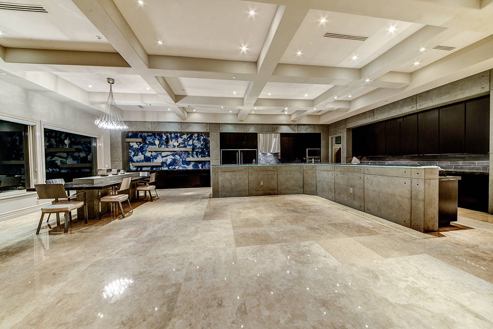 The large kitchen and dining area has a modern design.  (The Napoli Group)