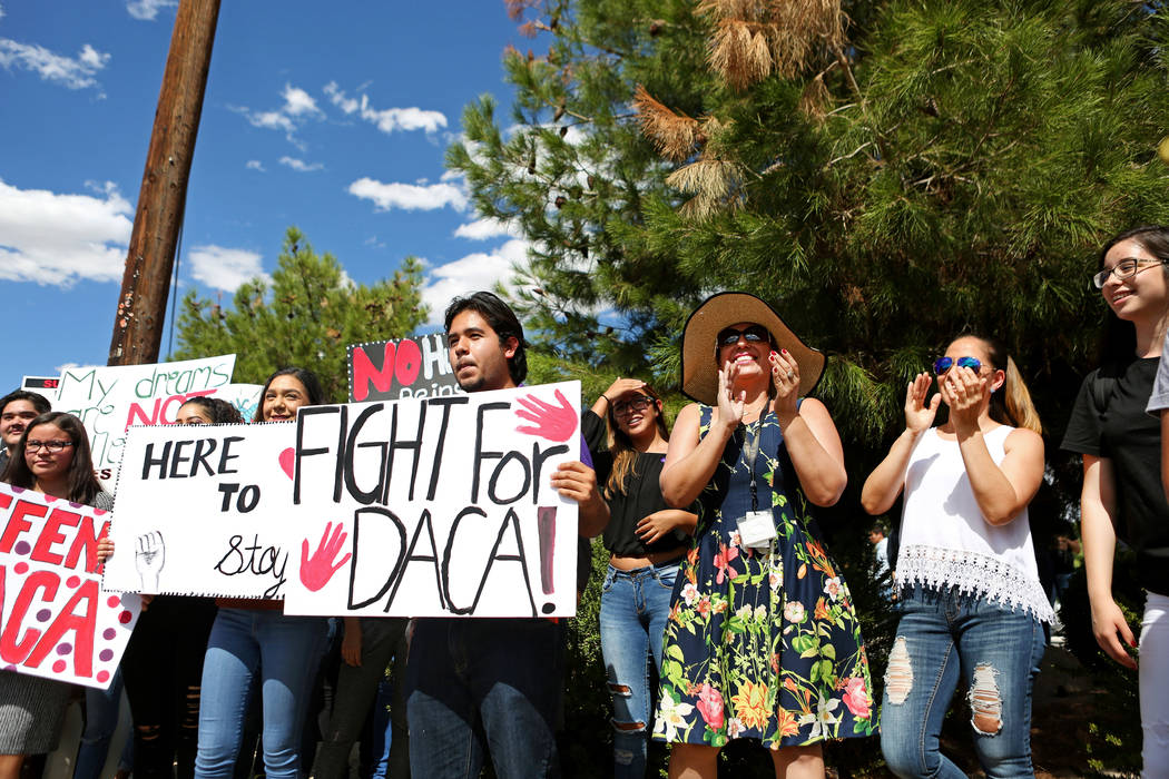 Individuals join in with high school students that organized a rally in support of the DREAM Act, at Rancho high school in Las Vegas, Wednesday, Sept. 13, 207. Elizabeth Brumley Las Vegas Review-J ...