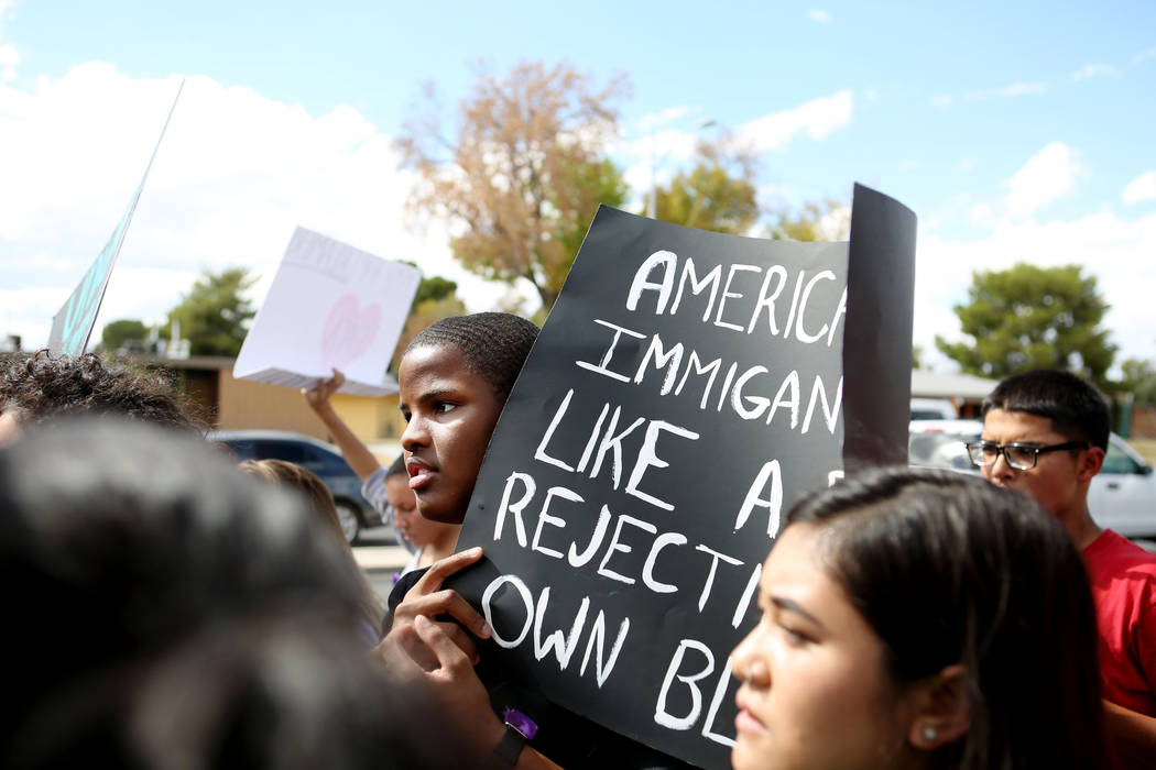High school student JaVaughn Rhodes participates in a  rally in support of the DREAM Act in honor of his friends who have received DACA, at Rancho high school in Las Vegas, Wednesday, Sept. 13, 20 ...